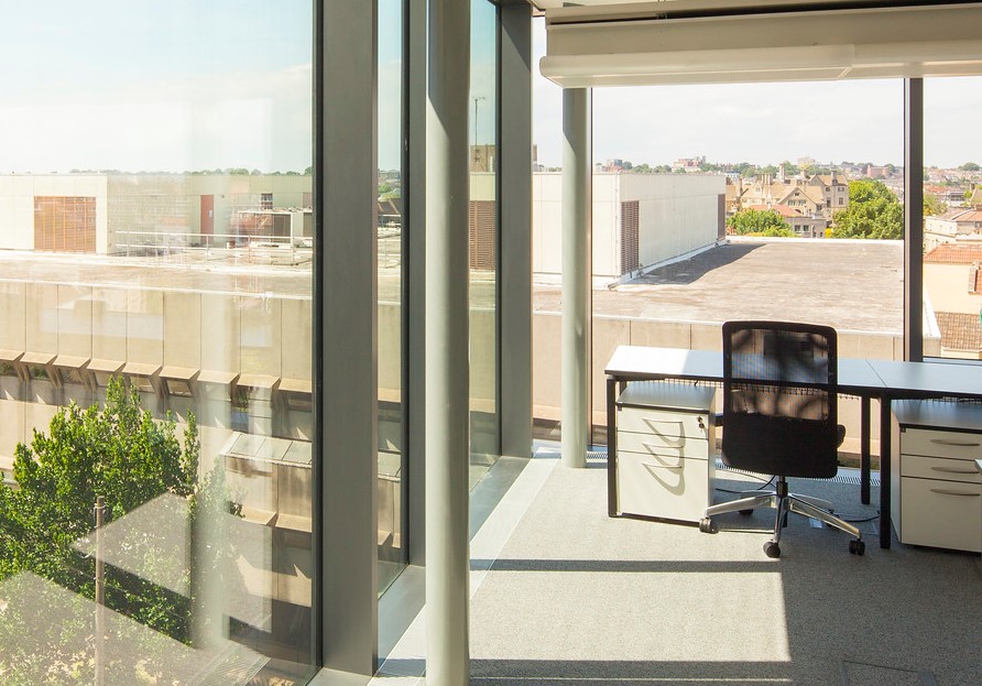 Workspace in Life Sciences building with view